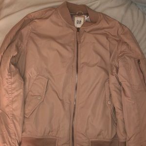Blush pink bomber jacket.